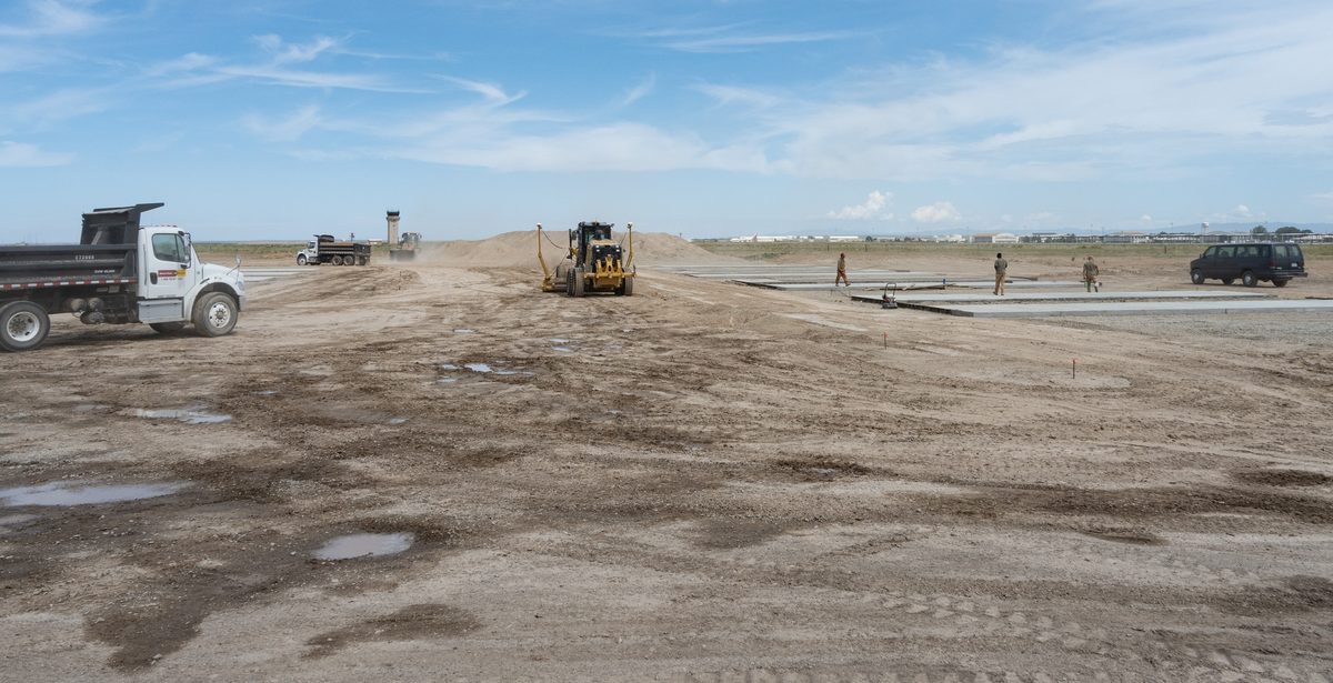 RED HORSE squadron airmen working on airfield construction at a regional training site
