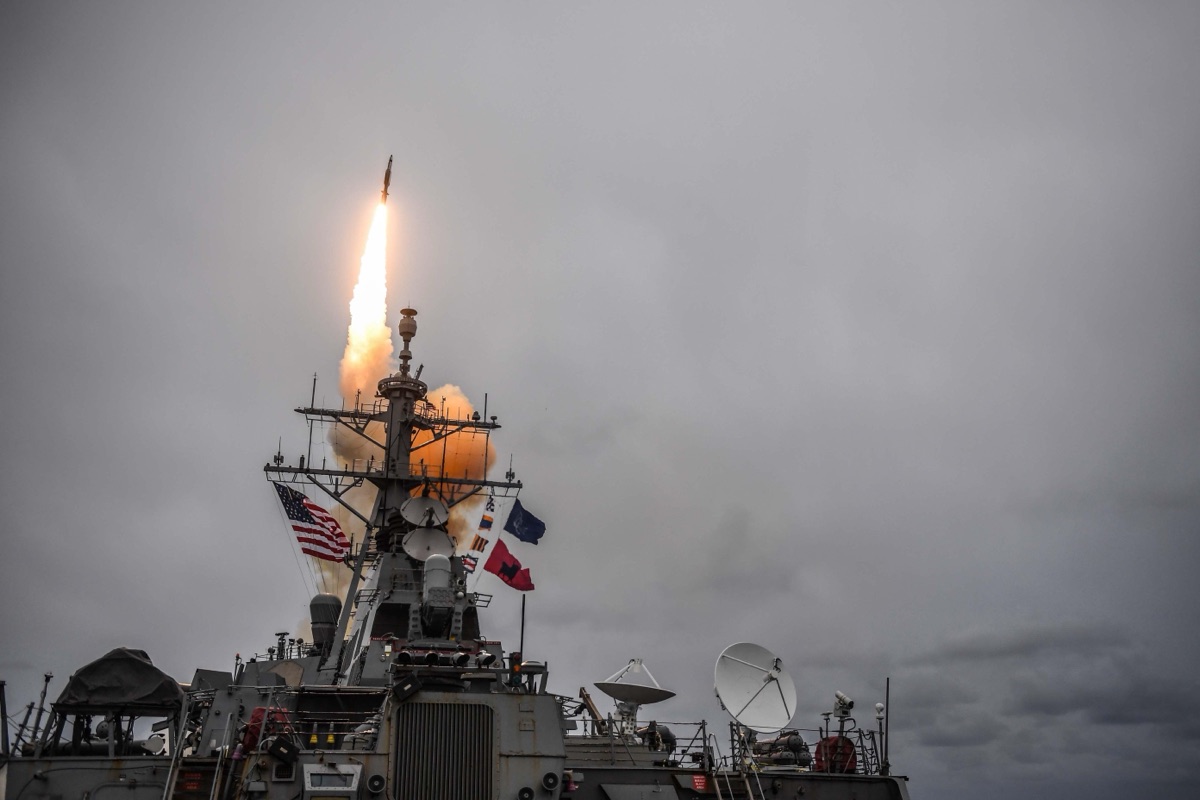 SM-3 missile launching from an Aegis destroyer against a ballistic missile target