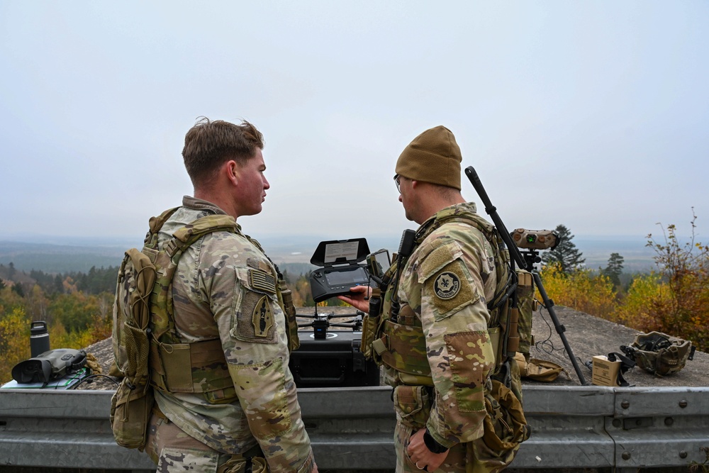 U.S. Soldiers use a drone to check visibility before launching a Switchblade 600 loitering munition during training at Grafenwoehr Training Area, Germany