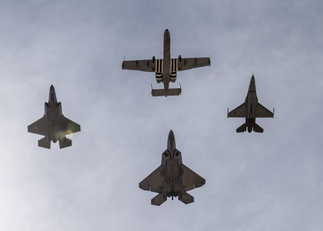 Four-ship heritage formation flight with an F-35A Lightning II, A-10 Thunderbolt II, F-22 Raptor, and F-16 Fighting Falcon flying in formation
