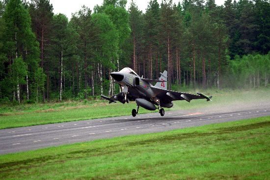 Gripen fighter aircraft operating from a highway road strip in Sweden