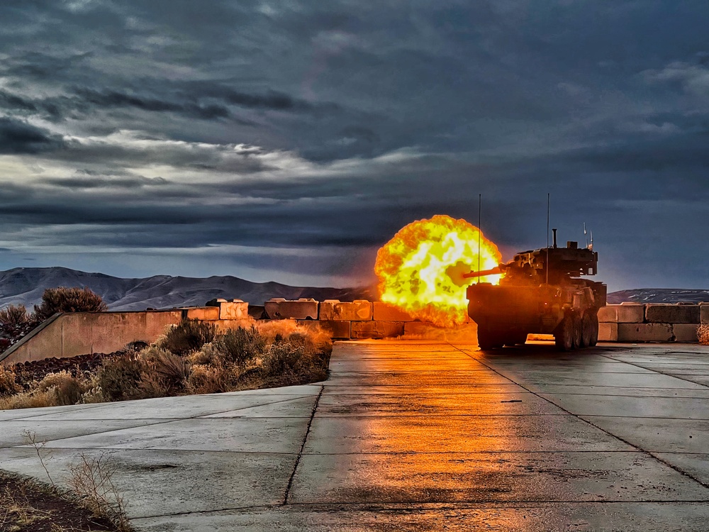 Stryker M1128 Mobile Gun System firing a canister round during training