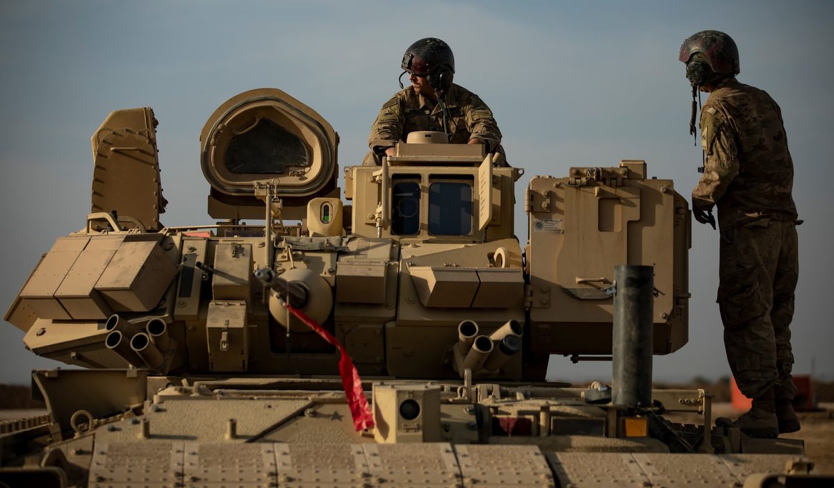 M2 Bradley infantry fighting vehicle in desert camouflage, the controversial IFV that survived its troubled development to become a capable combat platform