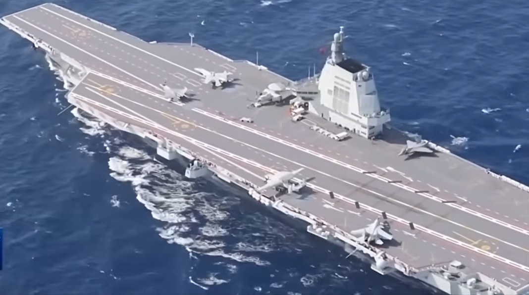 China's third aircraft carrier Fujian at Jiangnan Shipyard in Shanghai showing its flat deck and electromagnetic catapults