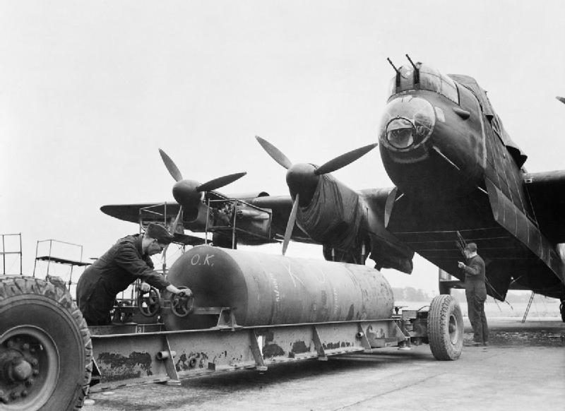Ground crew loading a 8,000-pound Cookie bomb into a Lancaster's massive unobstructed bomb bay