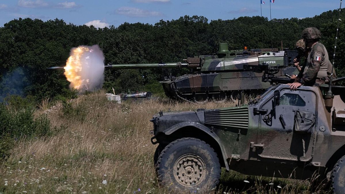 Leclerc main battle tank firing its CN120-26 gun with visible muzzle flash