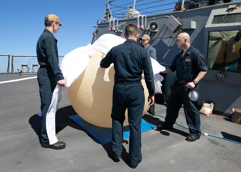 AN/SPY-6 AMDR radar array installed on a US Navy Arleigh Burke Flight III destroyer showing the large flat panel antenna
