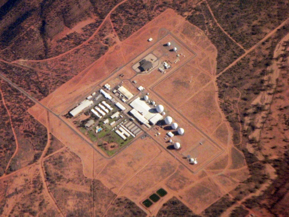 Military officials discussing space-based intelligence, surveillance, and reconnaissance capabilities at a command center