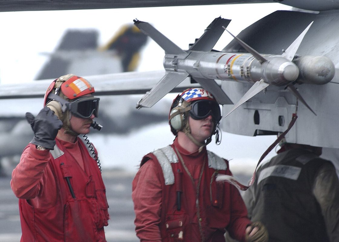 AIM-9 Sidewinder missile mounted on an F-14 Tomcat fighter showing the infrared seeker head