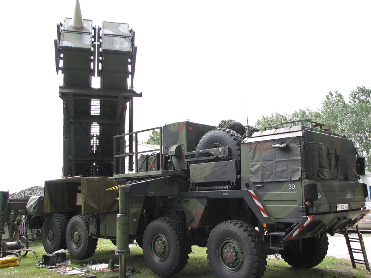 Patriot air defense system components being prepared for deployment during a military exercise