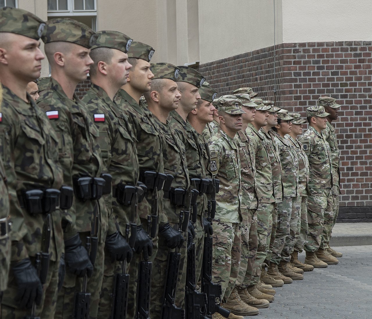 Polish Army soldiers and armored vehicles during a NATO military exercise in eastern Poland