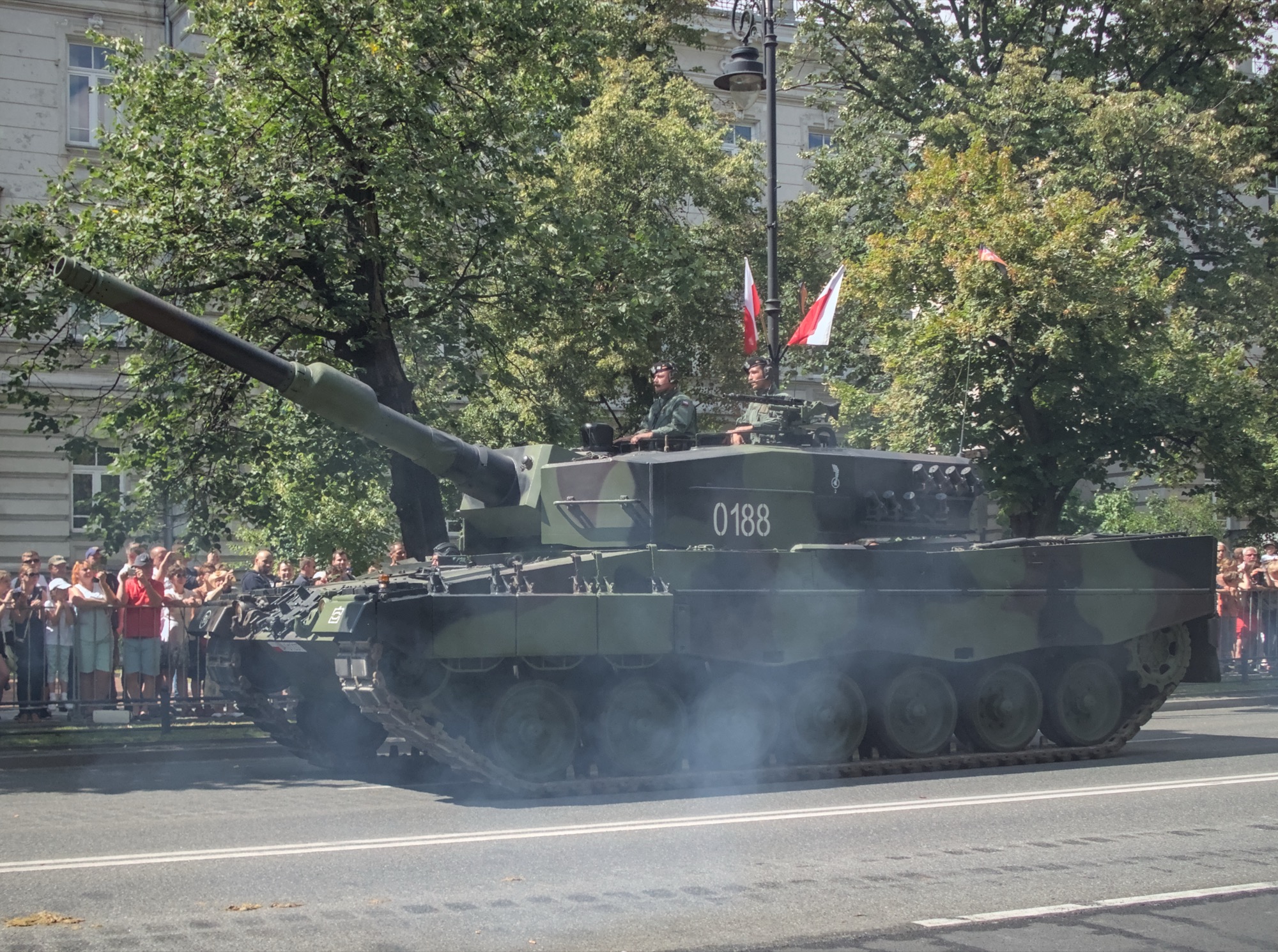 Polish military vehicles and soldiers in formation during Armed Forces Day parade in Warsaw