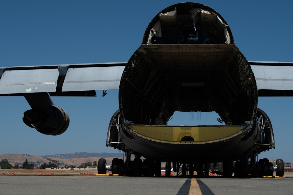 A partially disassembled C-5A Galaxy aircraft at Travis Air Force Base