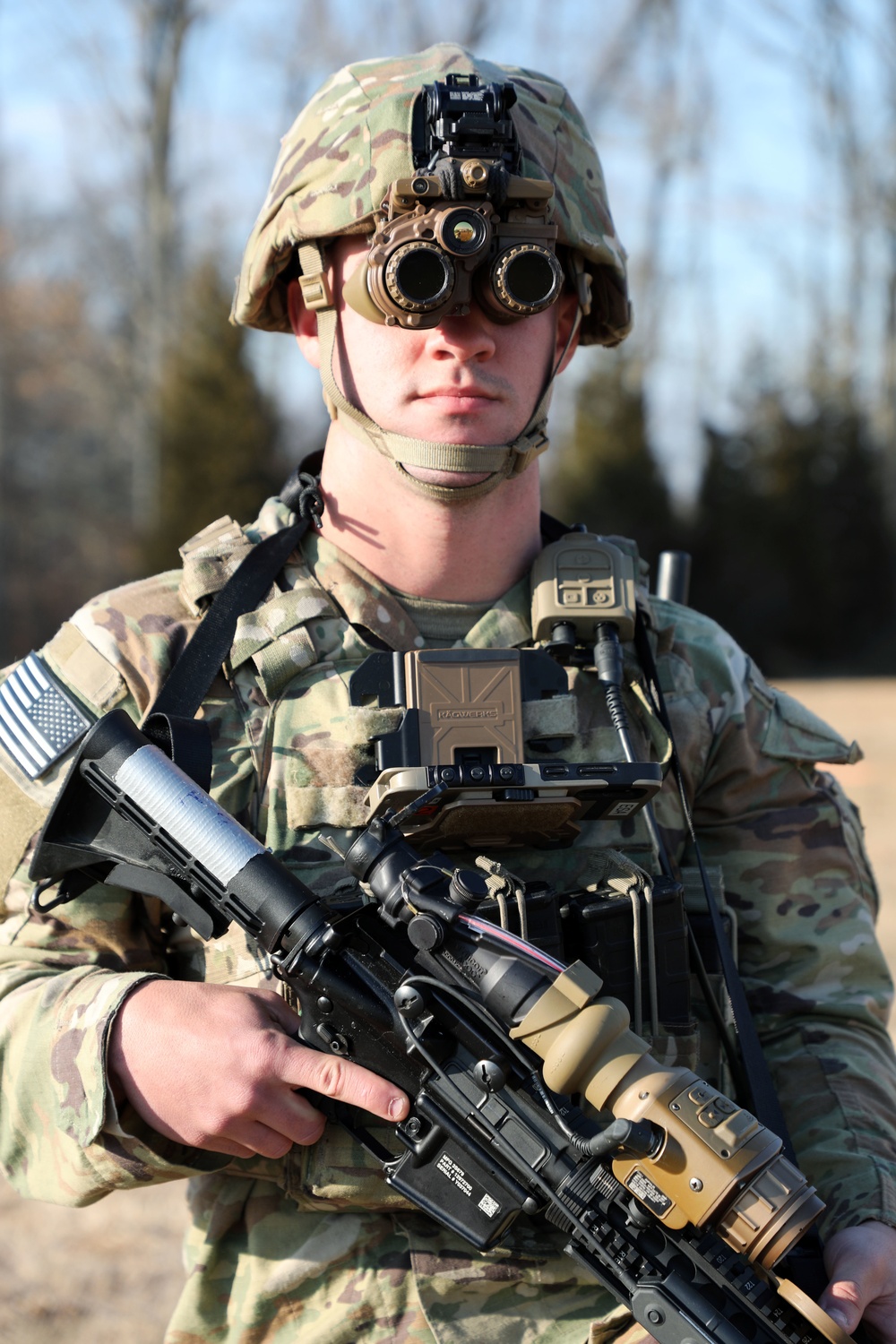 U.S. Army soldier wearing Enhanced Night Vision Goggle-Binocular system with weapon sight integration