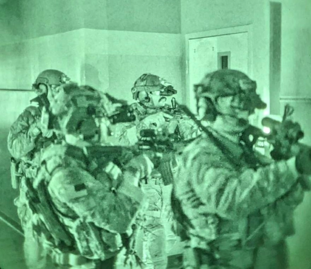 Green Berets conduct close quarters battle training during the Special Forces Advanced Urban Combat course at Joint Base Lewis-McChord, February 2022. U.S. Army courtesy photo.