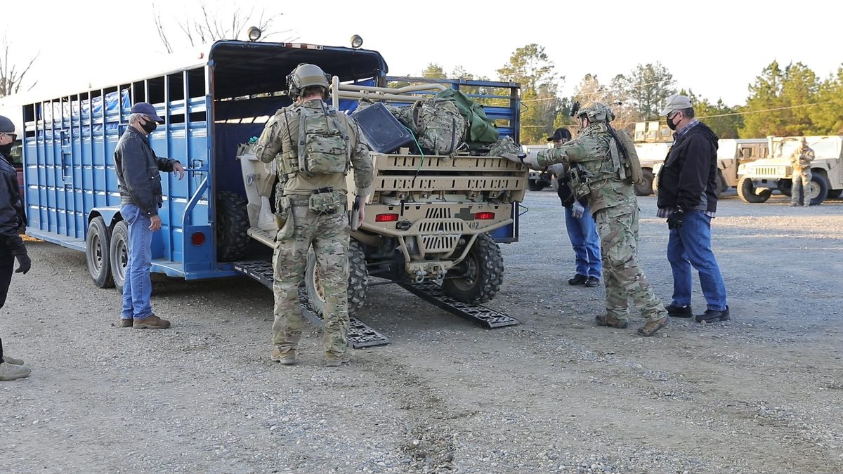 Special Forces Ground Mobility Vehicle with mounted weapons and equipment during a training exercise