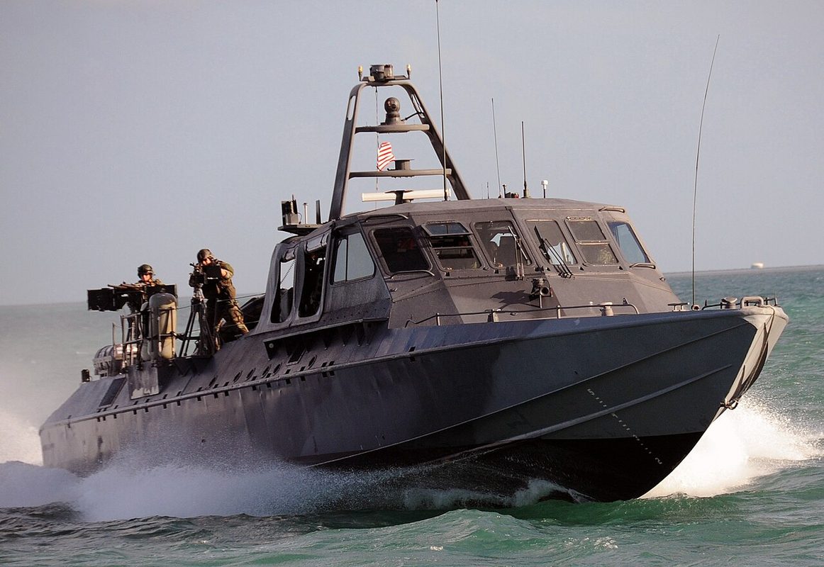 Mark V Special Operations Craft at high speed on open water