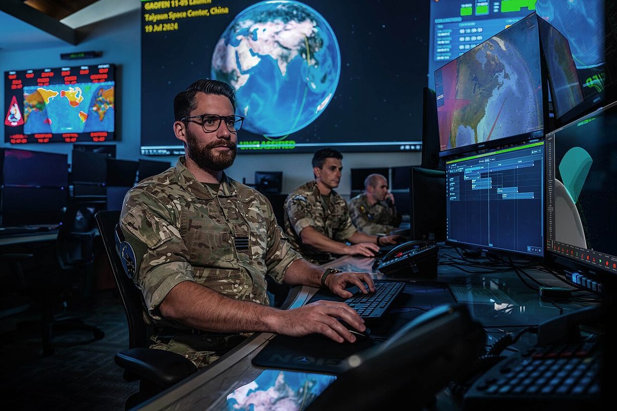 Combined Space Operations Center staff monitoring space surveillance workstations