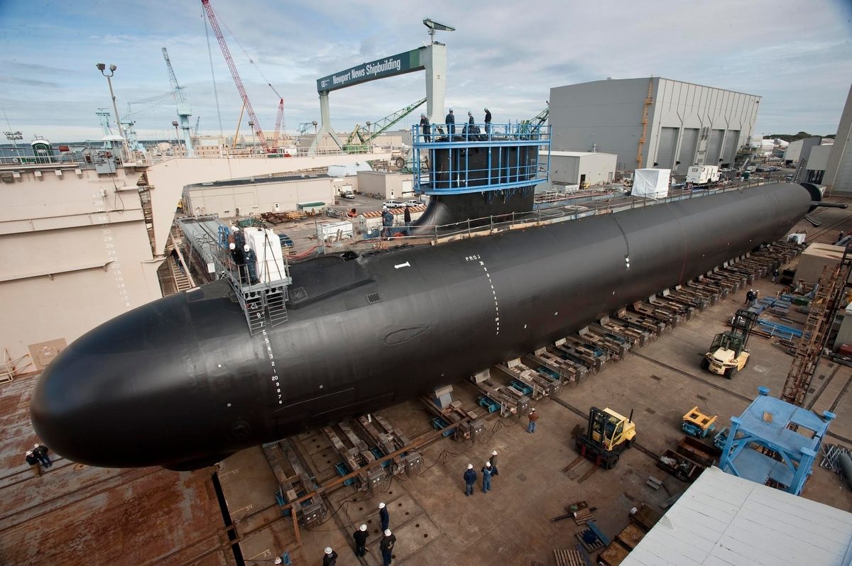 Virginia-class attack submarine Minnesota (SSN 783) under construction at Newport News Shipbuilding, showing the massive hull and bow section