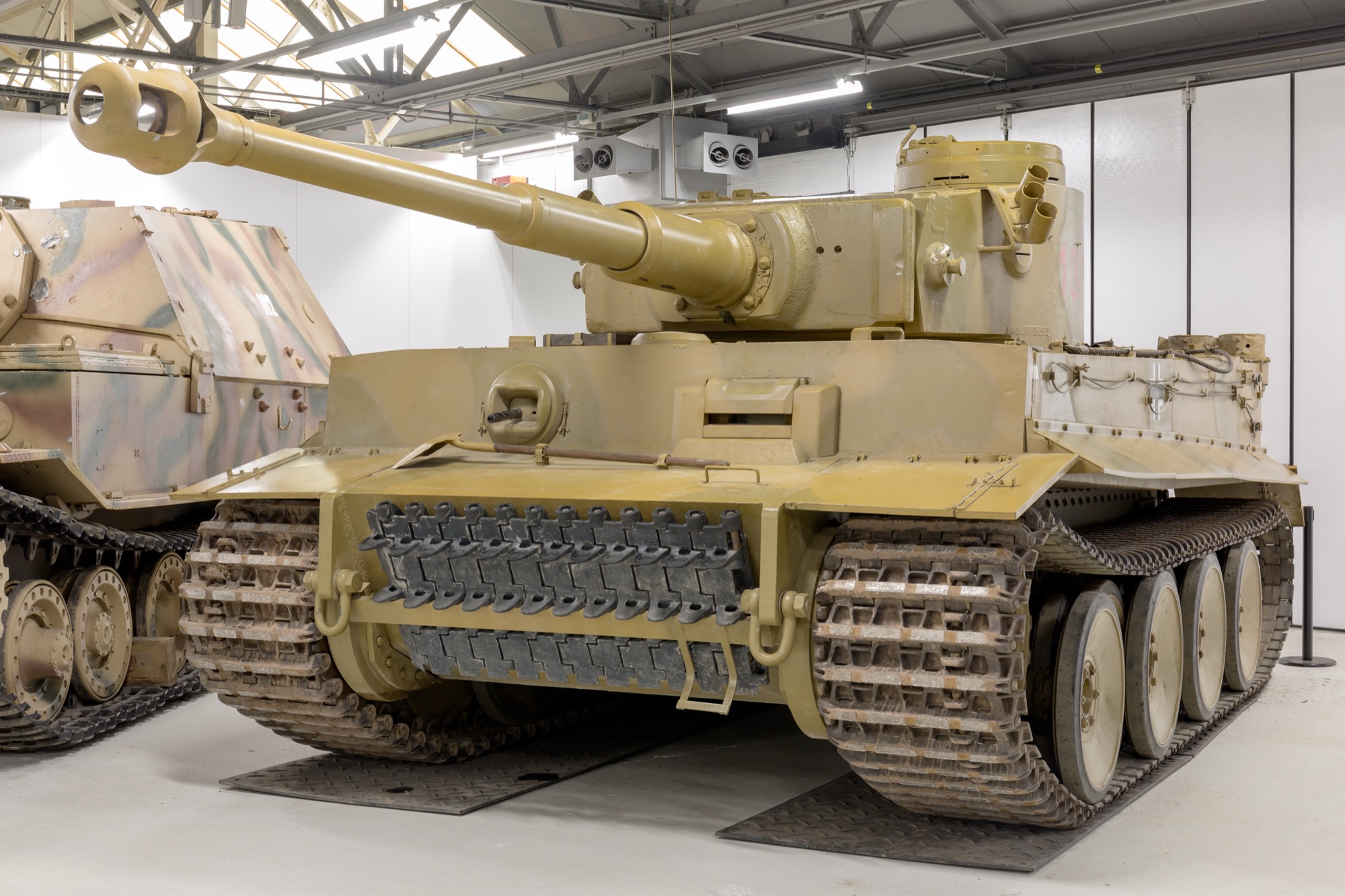 Preserved Tiger I tank on display at a military museum showing the vehicle's heavy armor and 88mm main gun