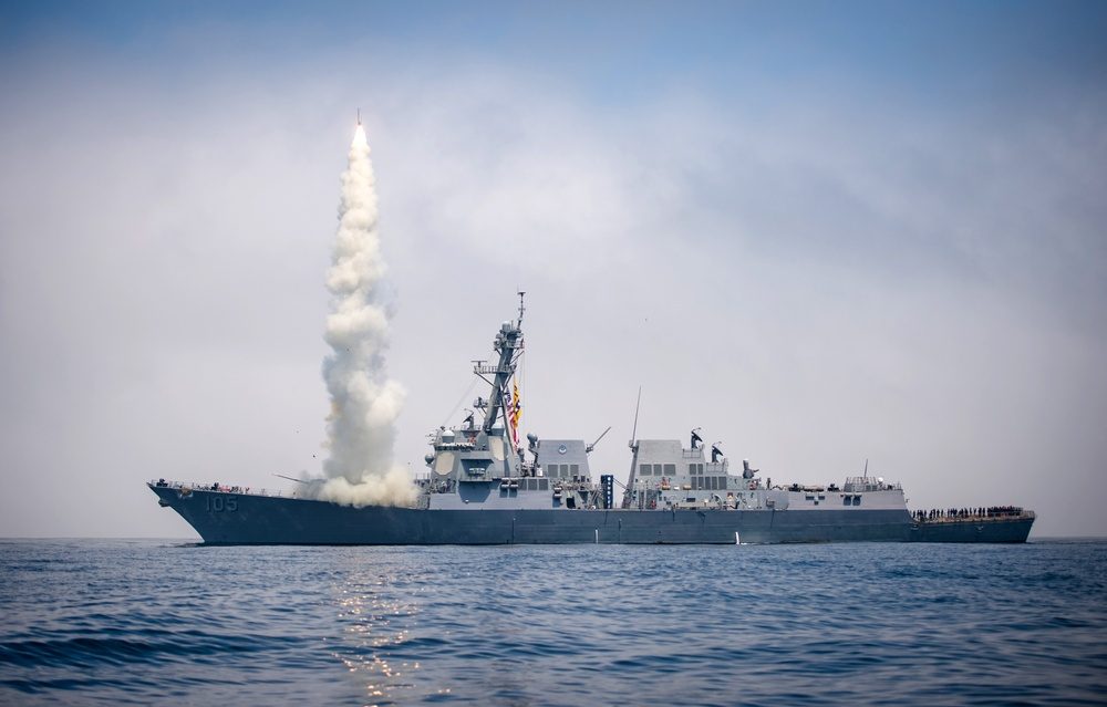 Tomahawk cruise missile launching from USS Dewey at sea during a live-fire exercise