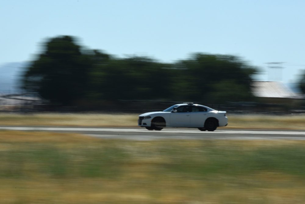 White chase car on the runway at Beale Air Force Base used to guide U-2 landings