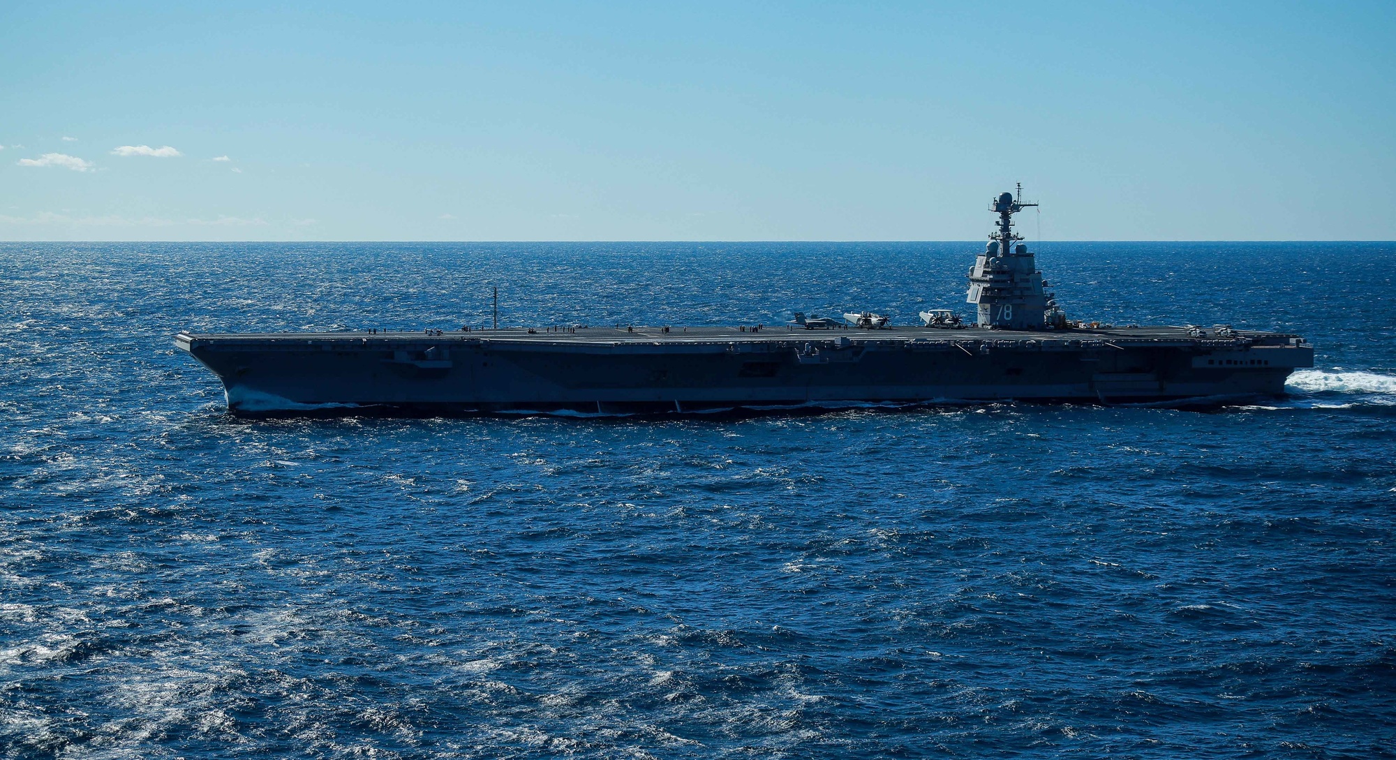 USS Gerald R. Ford nuclear-powered aircraft carrier underway at sea with aircraft on the flight deck