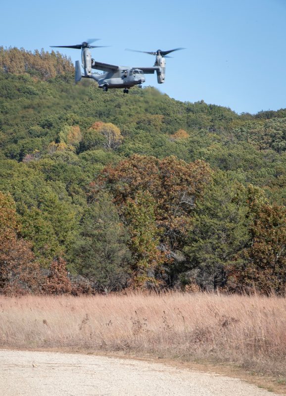Multiple V-22 Ospreys parked on an airfield at Fort McCoy Wisconsin with their distinctive tiltrotor nacelles visible