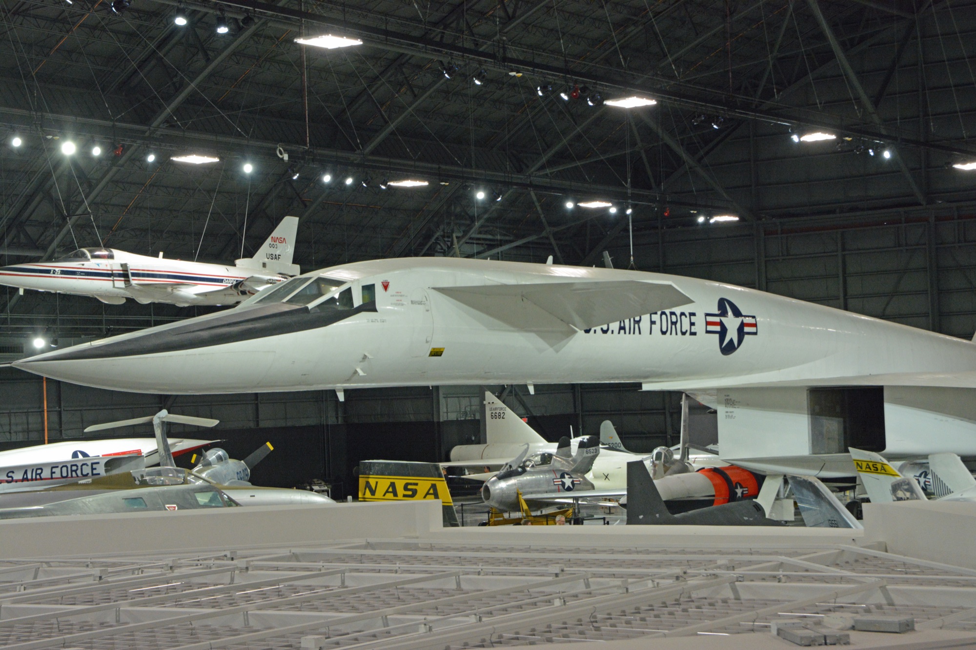 XB-70 Valkyrie in flight with wingtips drooped downward for high-speed compression lift