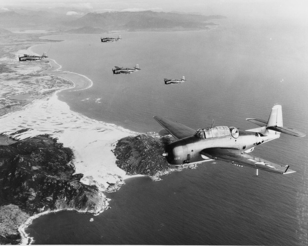 Formation of TBF Avenger torpedo bombers in flight during World War II