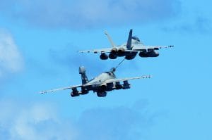 F/A-18 refueling an E-6 Prowler. 
