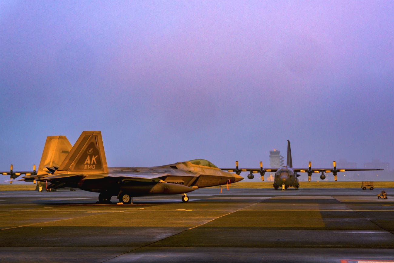 F-22 Raptor With C-130s