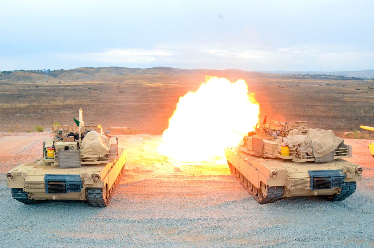 M1 Tanks firing rounds