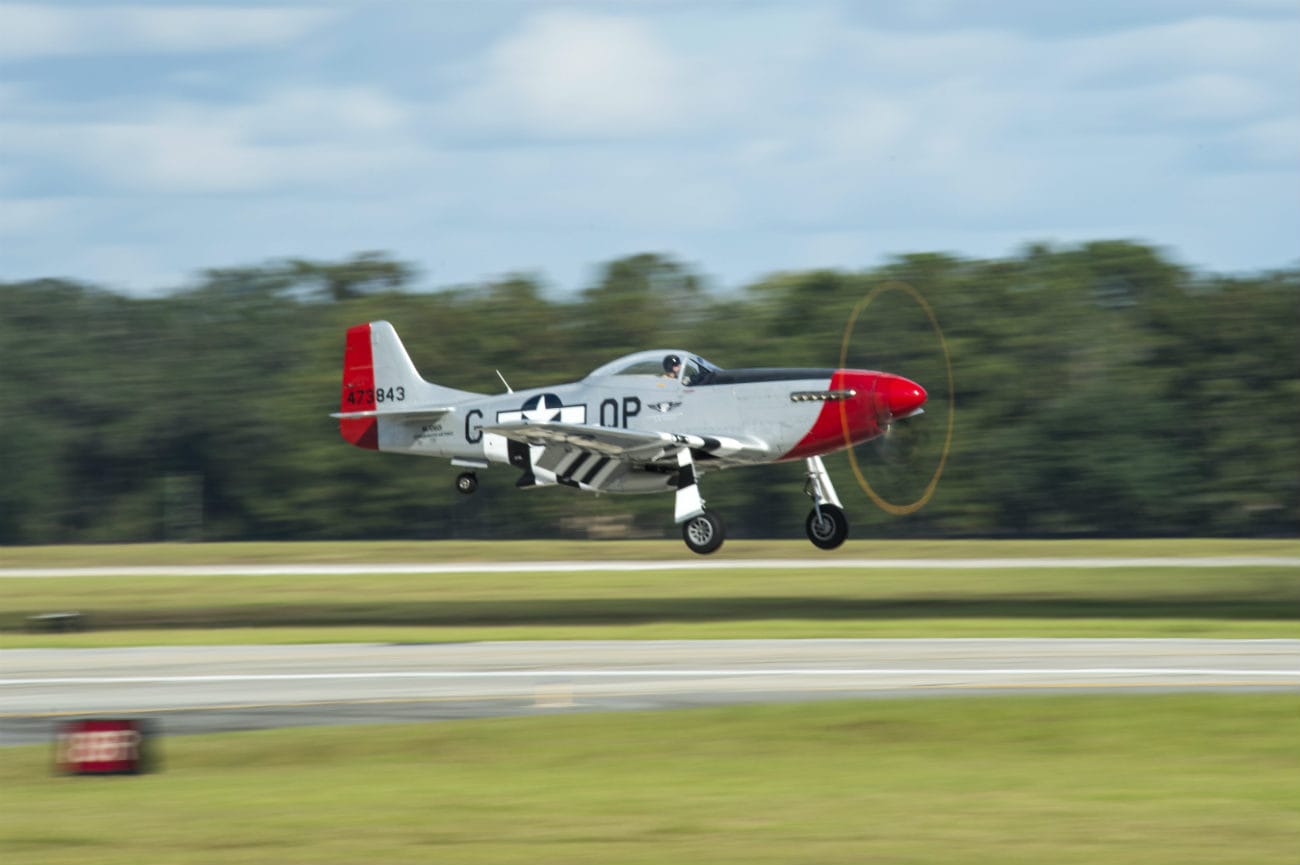 P-51 Mustang landing at an air force base