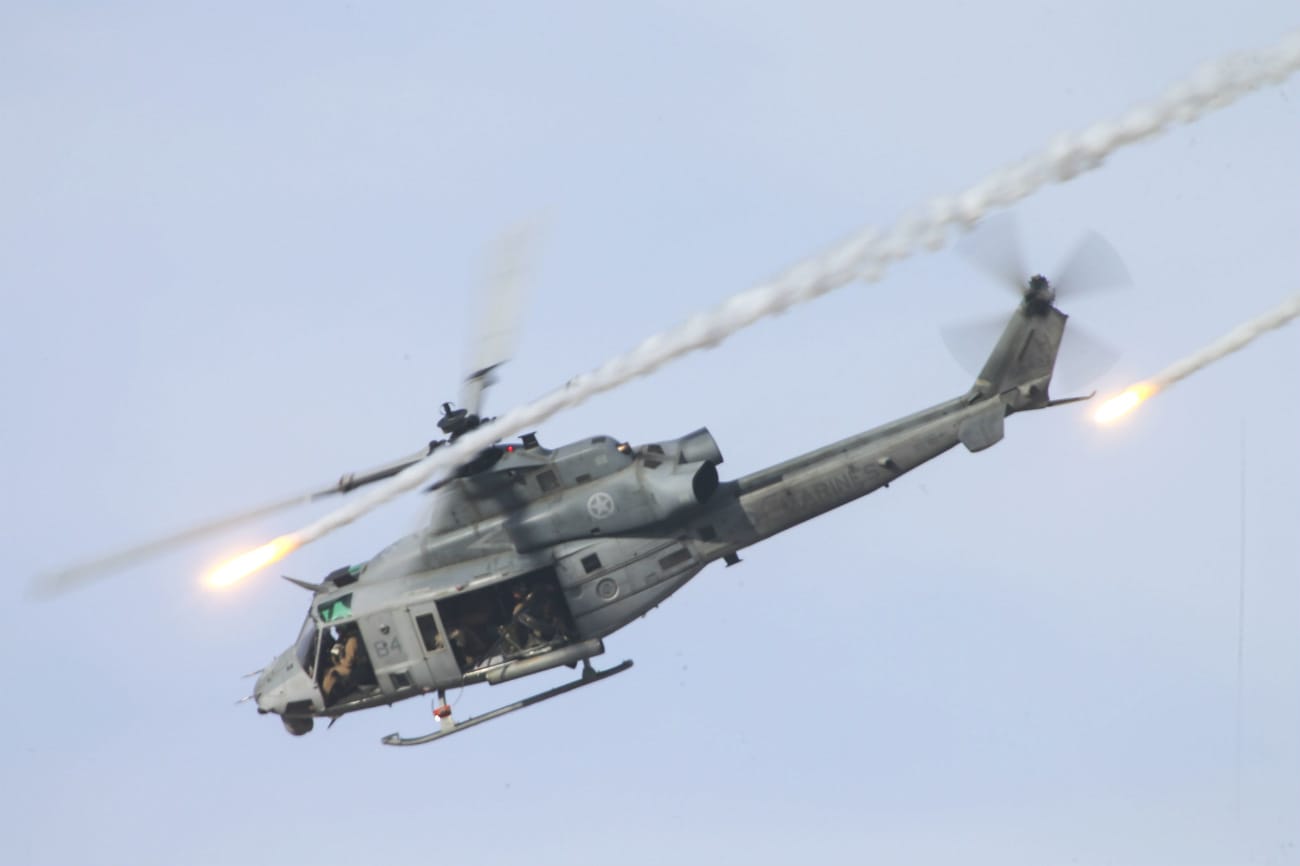 UH-1 Aircraft fires missiles