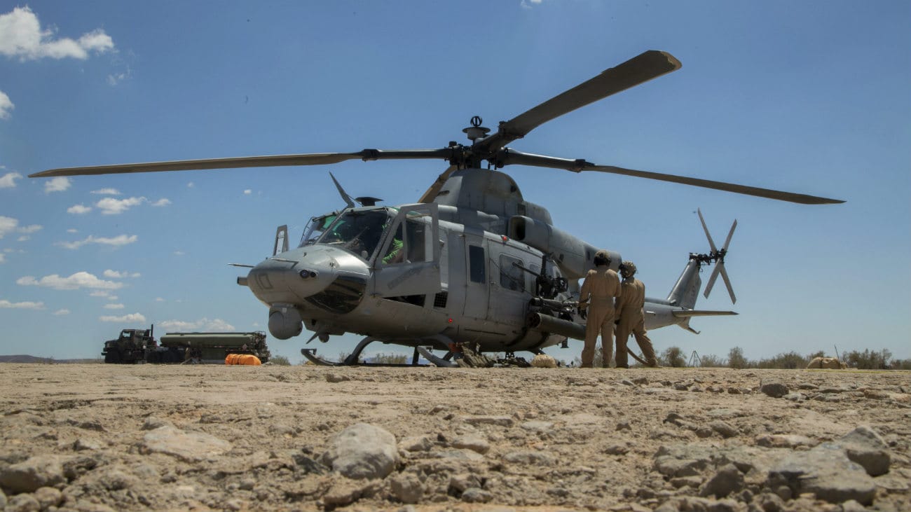 Bell UH-1 Images Helicopter Aircraft parked