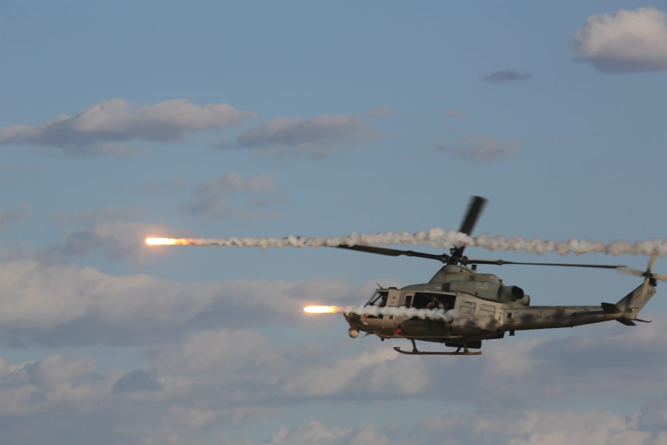 UH-1 Huey fires rockets
