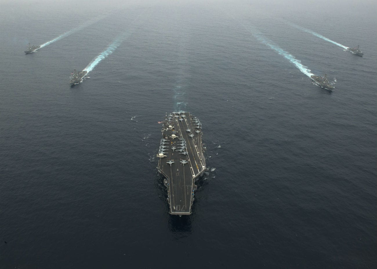 Aircraft carrier in formation
