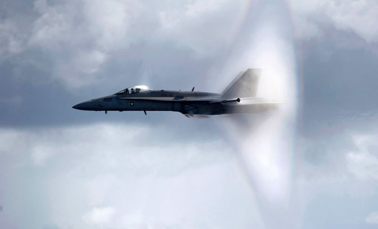 FA 18C Hornet Breaks Sound Barrier Over Nimitz Class Aircraft Carrier