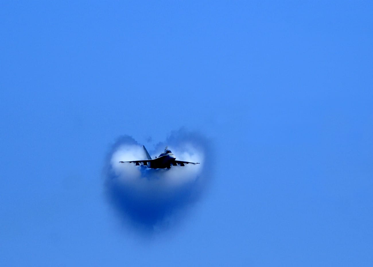FA-18F Super Hornet breaks through the sound barrier during an air power demo