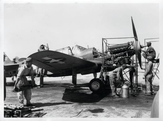 Tuskegee Airmen working on a P-40-Warhawk
