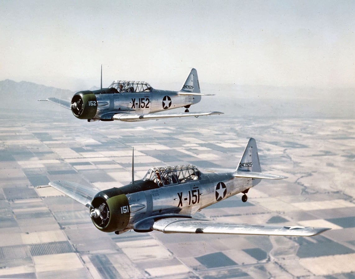 AT-6C Texan trainers flying in formation during WWII