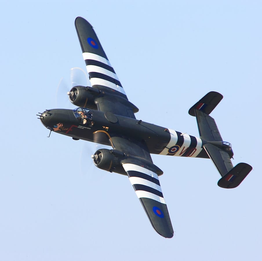 B-25 Mitchell bomber banking in flight