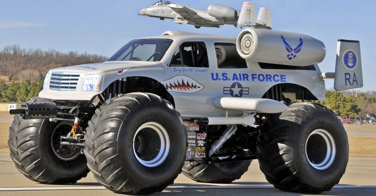 A-10 Warthog flies over an A-10 monster truck above the runway at the Fort Smith (Ark.) Regional Airport