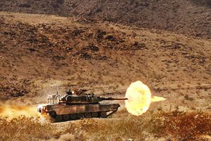 Battle tank fires M1 Abrams