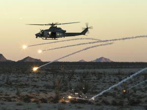 UH-1 Helicopter fires rounds