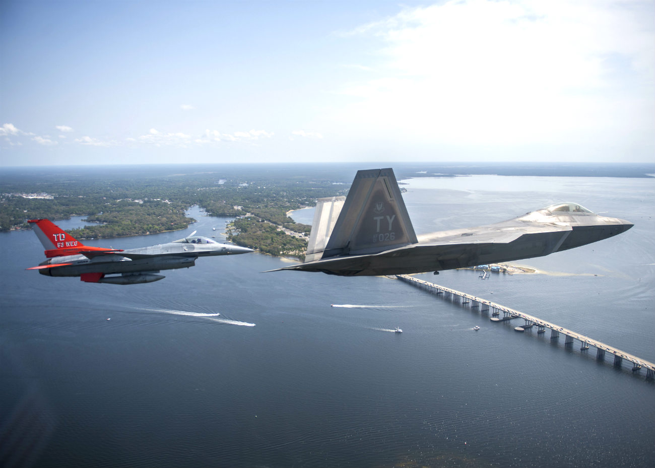 F-22 and F-16 in air