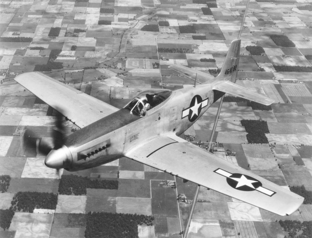 A P-51 Mustang in Flight Over Rural America