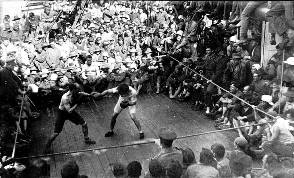 soldier boxing match aboard ship