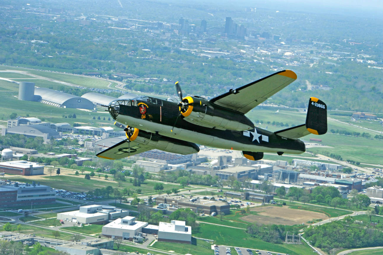B-25 Mitchell bomber performs a flyby over the National Museum of the U.S. Air Force